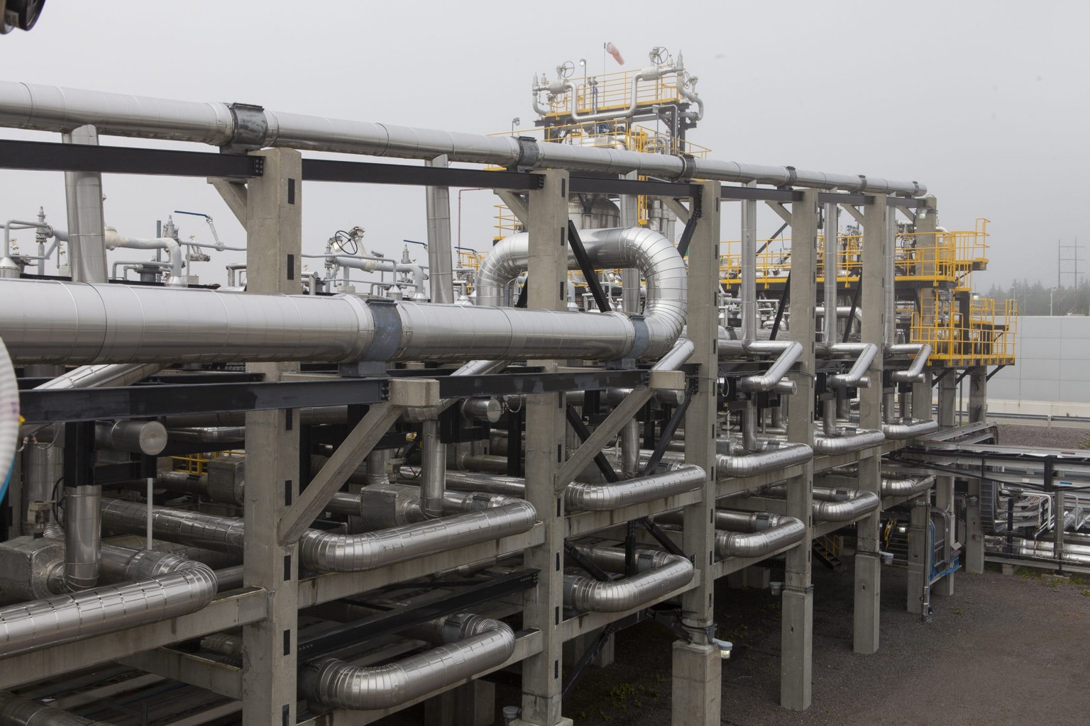 Insulated pipelines on racks